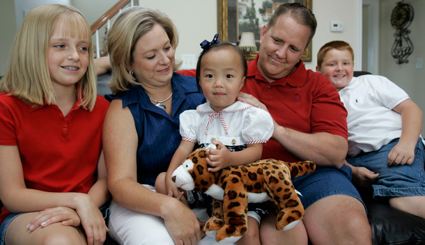 The Weserbarth family is one of millions around the country struggling with high insurance costs. (AP/Gerry Broome)