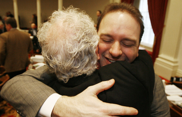 Rep. Jason Lorber (D-Burlington), right, gets a hug from Stan Baker following the passage of a gay marriage bill in Montpelier, VT, April 7, 2009. Vermont becomes the first state to establish marriage equality through legislative action. (AP/Toby Talbot)
