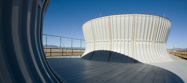 Cooling towers for geothermal power rise above the barren desert at Raser Technologies' Thermo Power Plant.
<br /> (AP/Douglas C. Pizac)