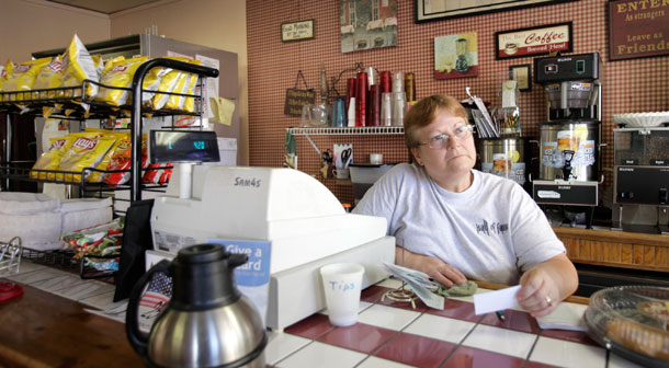 Patty Porter works the front counter of the tiny Hall of Fame Cafe, in downtown Wheeling, West Virginia. She and her husband, a receiving manager at Kmart, count themselves among the Americans who lack adequate health insurance coverage. David Balto believes the mission of the Federal Trade Commission and the DOJ's Antitrust Division is vital to protecting consumers and health insurance competition.
<br /> (AP/Amy Sancetta)