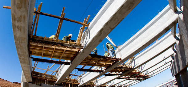 Construction crews work on a federal contract in Oklahoma City to build a new I-40 crosstown bridge. (AP/Bill Waugh)