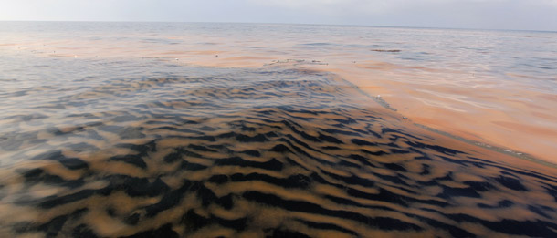 Oil from the Deepwater Horizon spill makes a pattern in the waters of Chandeleur Sound, LA, on May 6, 2010. BP is spending $5 million a week on advertising to restore its image after its oil disaster. Meanwhile, Big Oil and its allies have spent more than $126 million on television ads this year to promote the expansion of offshore oil drilling and defeat efforts to eliminate their tax loopholes. (AP/Alex Brandon)