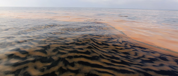 Oil from the Deepwater Horizon spill makes a pattern in the waters of Chandeleur Sound, LA, on May 6, 2010. BP is spending $5 million a week on advertising to restore its image after its oil disaster. Meanwhile, Big Oil and its allies have spent more than $126 million on television ads this year to promote the expansion of offshore oil drilling and defeat efforts to eliminate their tax loopholes. (AP/Alex Brandon)