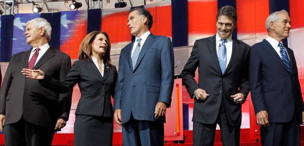 Republican presidential candidates, from left, former House Speaker Newt Gingrich, Rep. Michele Bachmann, (R-MN), former Massachusetts Gov. Mitt Romney, Texas Gov. Rick Perry, and Rep. Ron Paul (R-TX) stand together before a Republican presidential candidate debate at the Reagan Library on September 7, 2011, in Simi Valley, California. (AP/Chris Carlson)