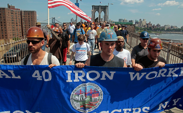 A coalition of New York City unions rally for a 