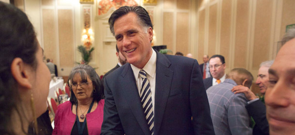 Mitt Romney's foreign policy team supports the Iraq invasion, nuclear war with Iran, and new arms race. (AP/Julie Jacobson)