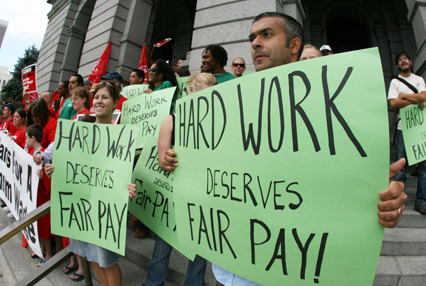 Recent studies show that increasing the minimum wage even during hard times is good policy, providing higher pay but no loss of jobs. (AP/ David Zalubowski)