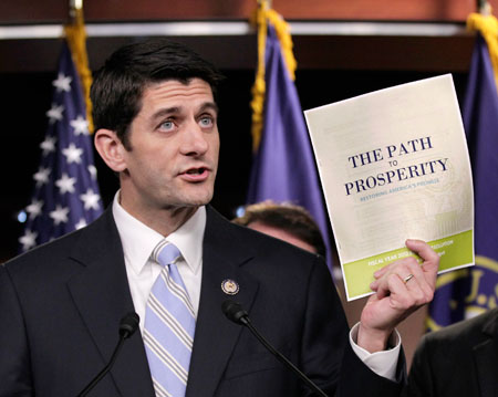 After properly accounting for Rep. Ryan’s tax cuts, his budget plan would never come close to balancing, and would add trillions more in debt. (AP/ J. Scott Applewhite)