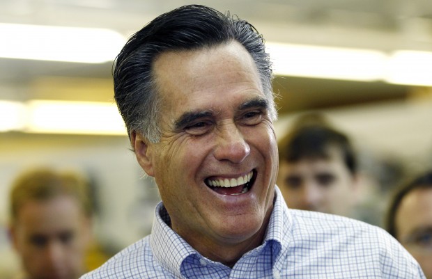 Between his specific spending increases and his specific tax cuts, Gov. Romney has actually proposed policies that would add well more than $7 trillion to the national debt. (AP/Charles Krupa)