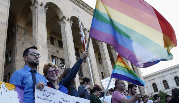 Gay rights activists stage a protest at the parliament building in Tbilisi, Georgia, Friday, May 18, 2012. (AP/Shakh Aivazov)