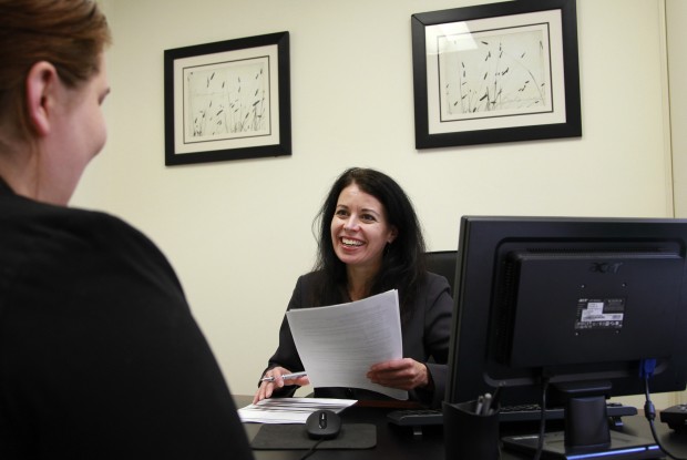 Jeanine Hamilton, right, owner of Hire Partnership, a staffing company, interviews Reidan Fredstrom, of Medford, Massachusetts, left, at Hamilton's office in downtown Boston. (AP/ Steven Senne)