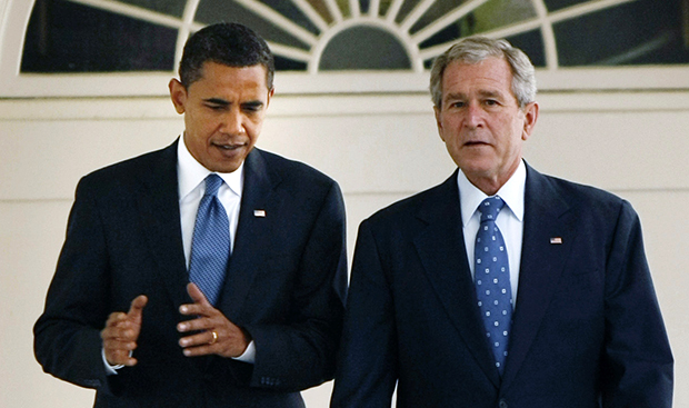 In this November 10, 2008, file photo, President George W. Bush walks with President-elect Barack Obama down the Colonnade of the White House in Washington. (AP/Gerald Herbert)