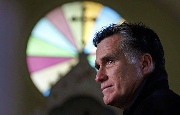 Republican presidential candidate and former Massachusetts Gov. Mitt Romney visits a church in Berlin, New Hampshire. Gov. Romney and the Mormon churh's founder, Joseph Smith, differ on many issues pertaining to the size government. (AP/Charles Krupa)