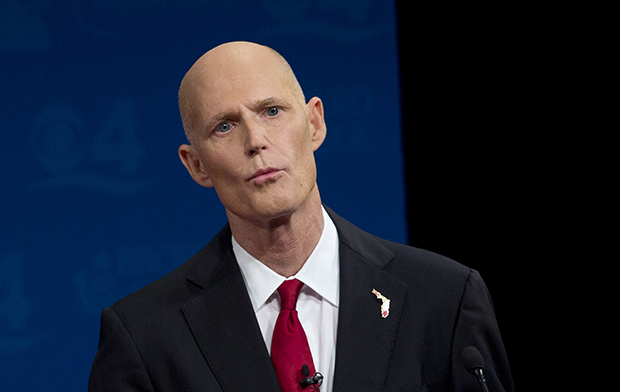 Florida Republican Gov. Rick Scott speaks during a debate with Democratic challenger Charlie Crist, October 15, 2014, in Davie, Florida. It was sponsored by the Florida Press Association and Leadership Florida. (AP/J Pat Carter)