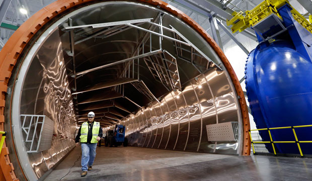 A worker walks out of a massive autoclave at the new Boeing construction facility on May 19, 2016, in Everett, Washington. (AP/Elaine Thompson)