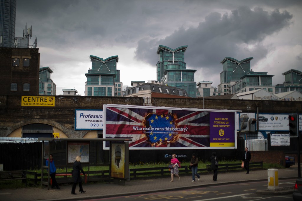 A UKIP European election billboard is displayed in the Vauxhall area of London, Tuesday, April 22, 2014. Britain's U.K. Independence Party has launched its European election campaign with a series of billboards carrying a stark message: They are coming to take your job. 