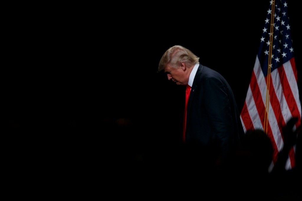 Republican presidential candidate Donald Trump leaves after giving an economic policy speech to the Detroit Economic Club, Monday, Aug. 8, 2016, in Detroit. (AP Photo/Evan Vucci)