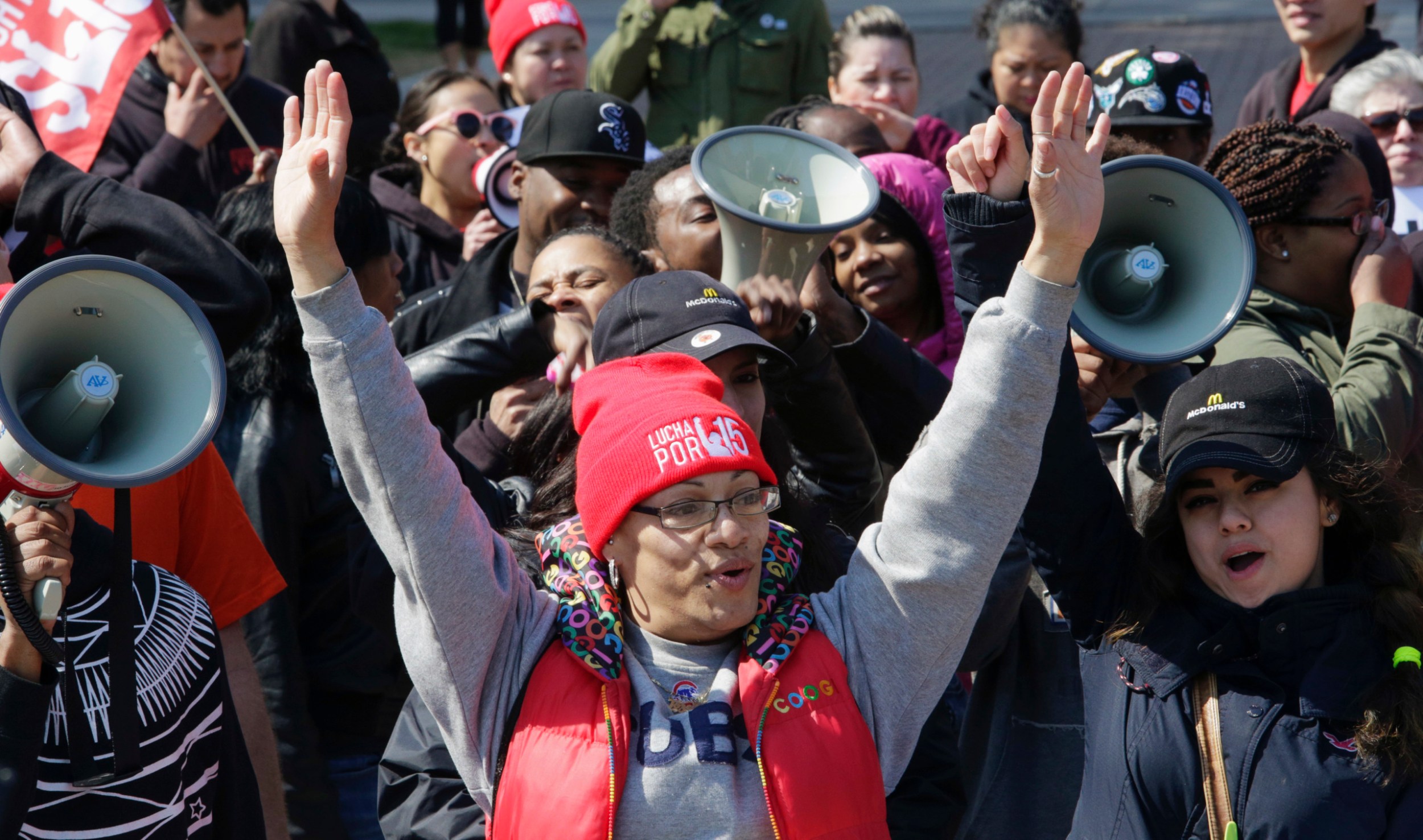 Fast-food worker Maria Rodriguez joins protesters gathered in Chicago on April 14, 2016, to call for a union and pay of $15 per hour. (AP/Teresa Crawford)