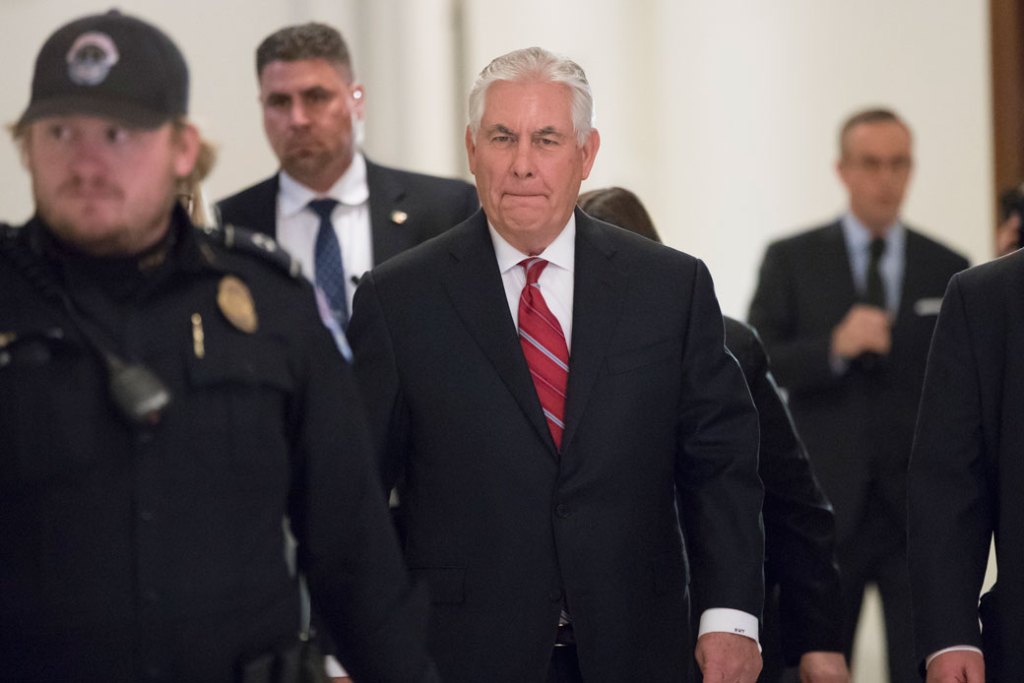 Secretary of State-designate Rex Tillerson arrives for a meeting with Senate Foreign Relations Committee member Sen. Chris Coons (D-DE). (AP/J. Scott Applewhite)