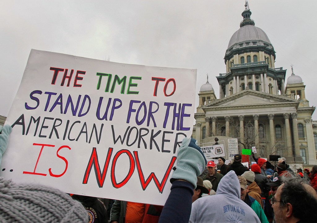 FILE - In this Feb. 26, 2011, file photo demonstrators rally in support of Wisconsin workers at the Illinois State Capitol in Springfield, Ill. As other states move to weaken public employee bargaining rights in the aftermath of the Wisconsin showdown, unions and their allies dare to hope they can turn rage into revival. This could be a make or break moment for a movement that brought the nation the 40-hour week, overtime pay, upward mobility, and now a struggle to stay relevant in the modern age. ( AP Photo/Seth Perlman, File)