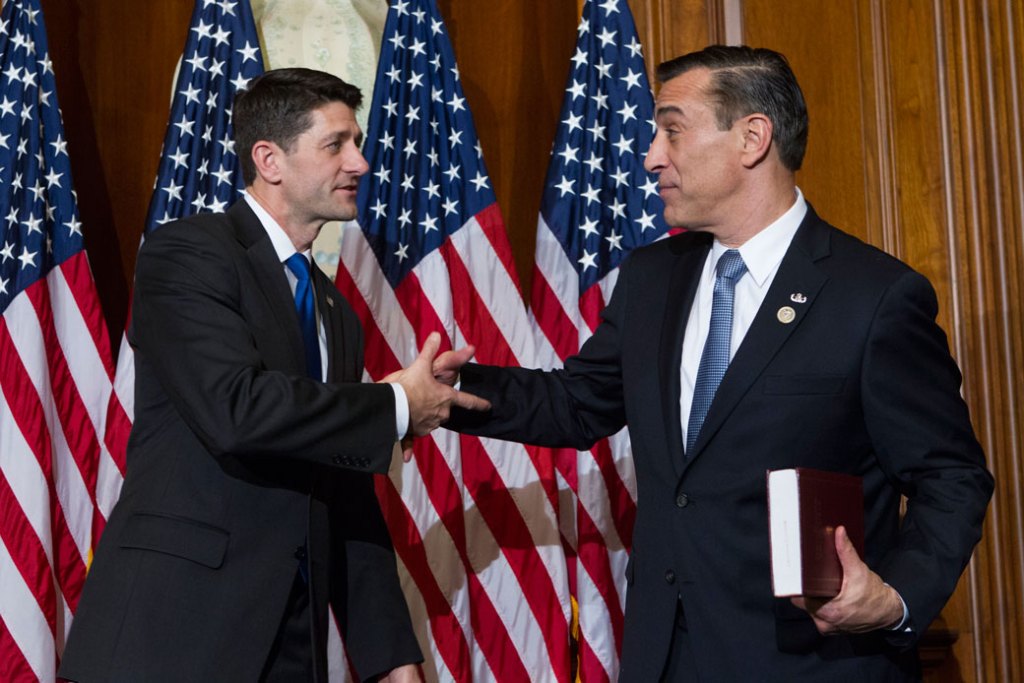 House Speaker Paul Ryan (R-WI) shakes hands with Rep. Darrell Issa (R-CA), on January 3, 2017, on Capitol Hill. ((AP/Jose Luis Magana))