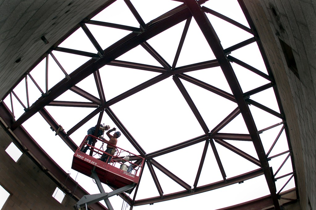 Iron workers weld metal beams on a new building being constructed in Oxnard, California. (Getty Images/Spencer Weiner)