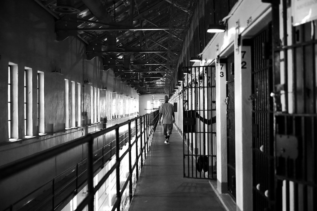 A man walks down the hallway near his cell June 2017, in San Quentin, California. (Getty/Ezra Shaw)