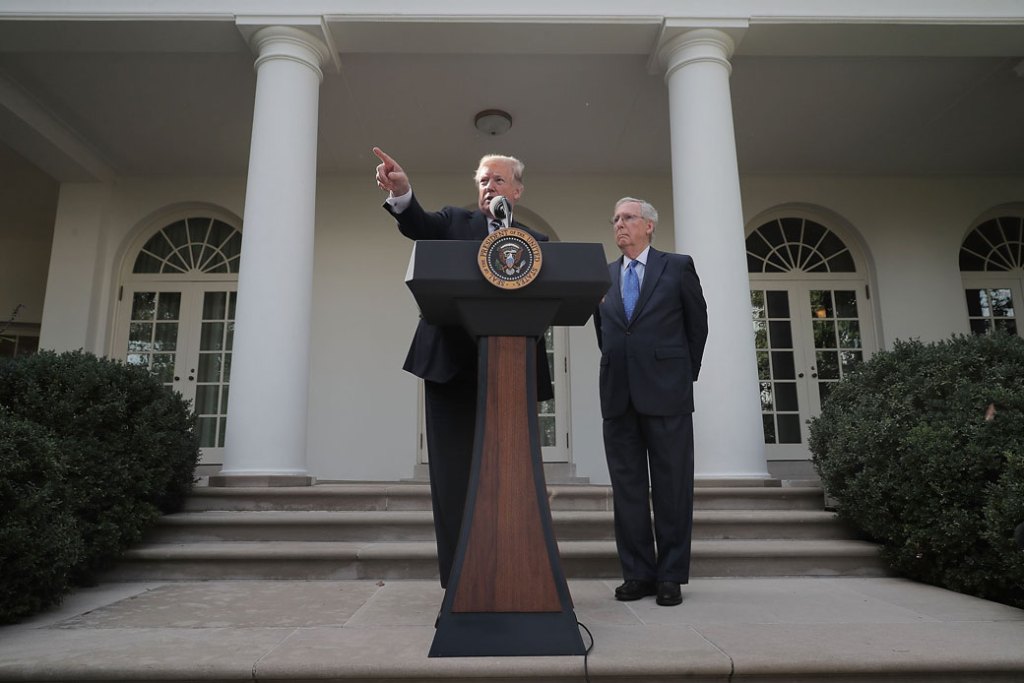 President Donald Trump and Senate Majority Leader Mitch McConnell (R-KY) talk to reporters in the Rose Garden at the White House, October 2017. (Getty/Chip Somodevilla)