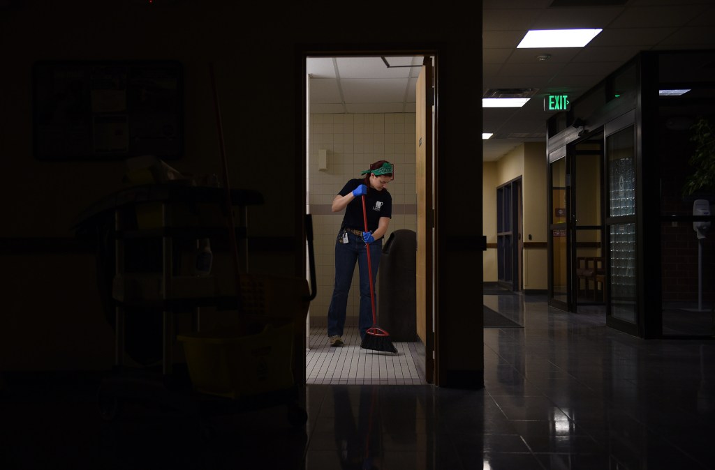 A custodian cleans the bathrooms at the Cecil County Health Department in Elkton, Maryland, on January 5, 2016. (Getty/Astrid Riecken)