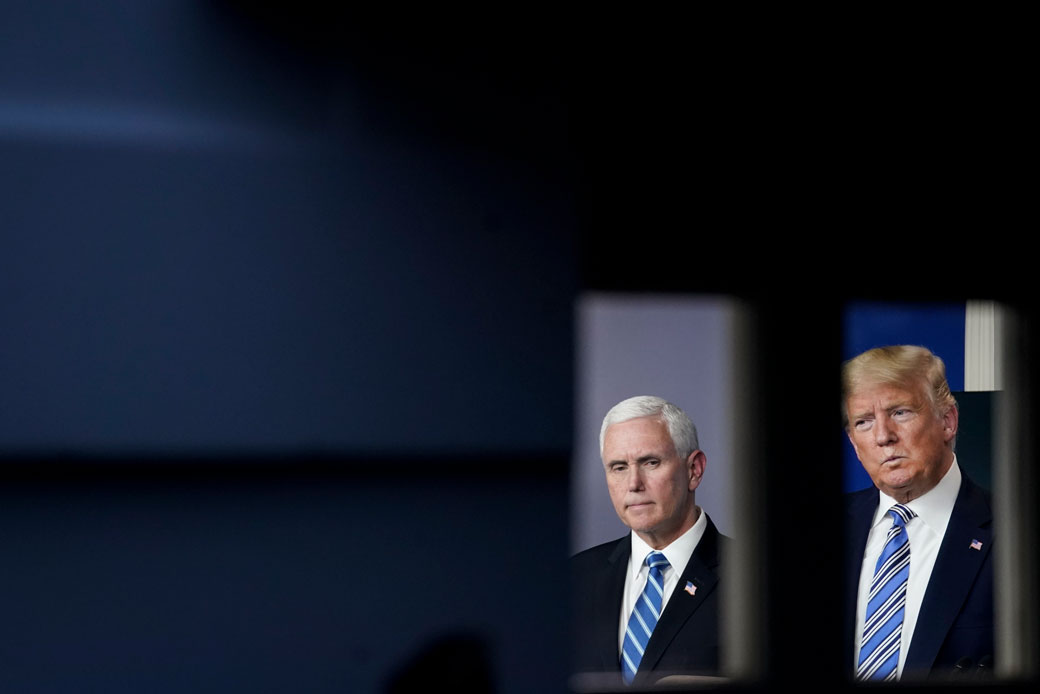 Vice President Mike Pence and President Donald Trump hold a press conference about the coronavirus outbreak in the press briefing room at the White House in Washington on March 23, 2020. (Getty/Drew Angerer)