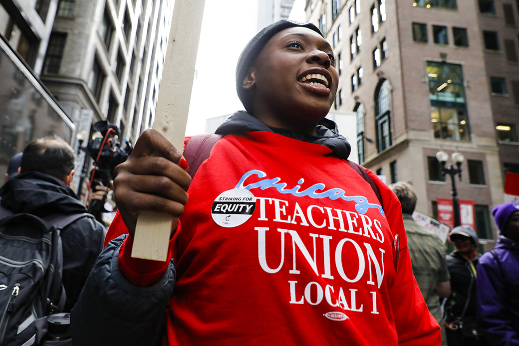 A teacher takes part in a strike rally in Chicago, October 2019. (Getty/Joel Lerner)