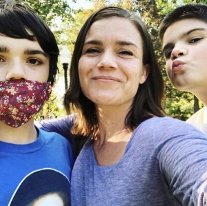 Jodi Newell is pictured with her sons, Corado and Benny, in April 2022. 