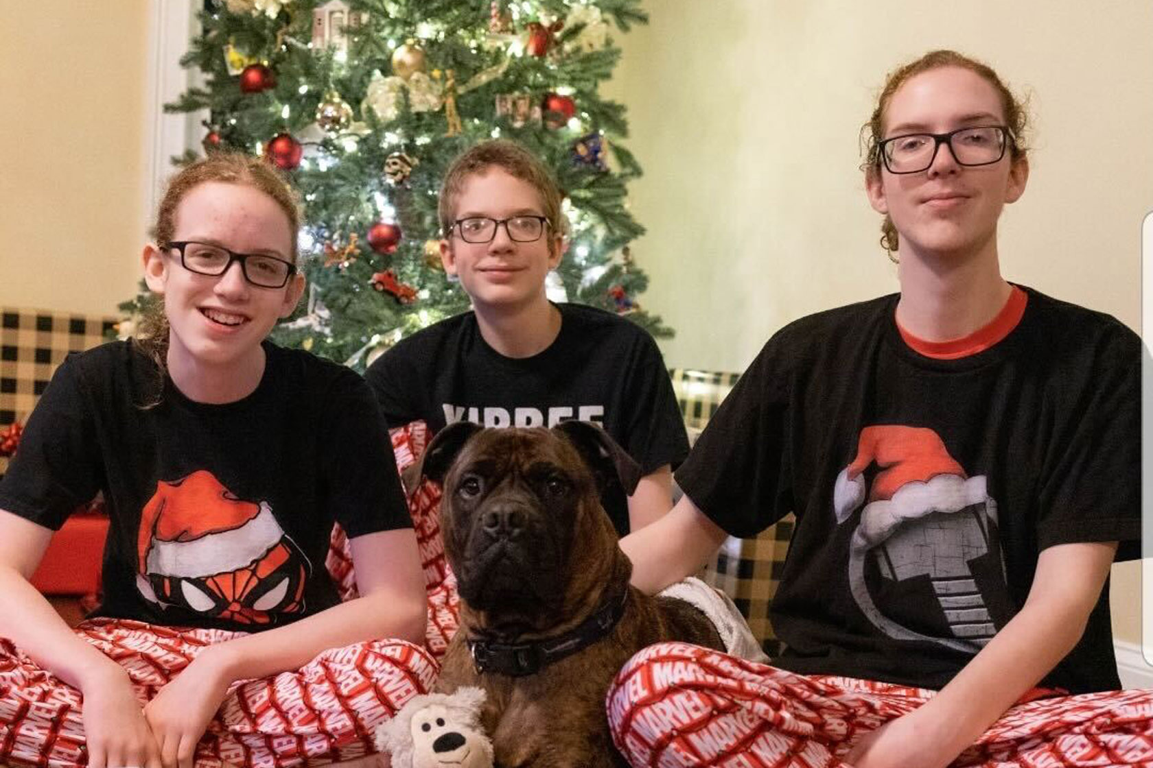 From left, Shannon Bjorneby’s sons, Grey, John, and James, are pictured on Christmas 2021. (Photo credit: Shannon Bjorneby) 