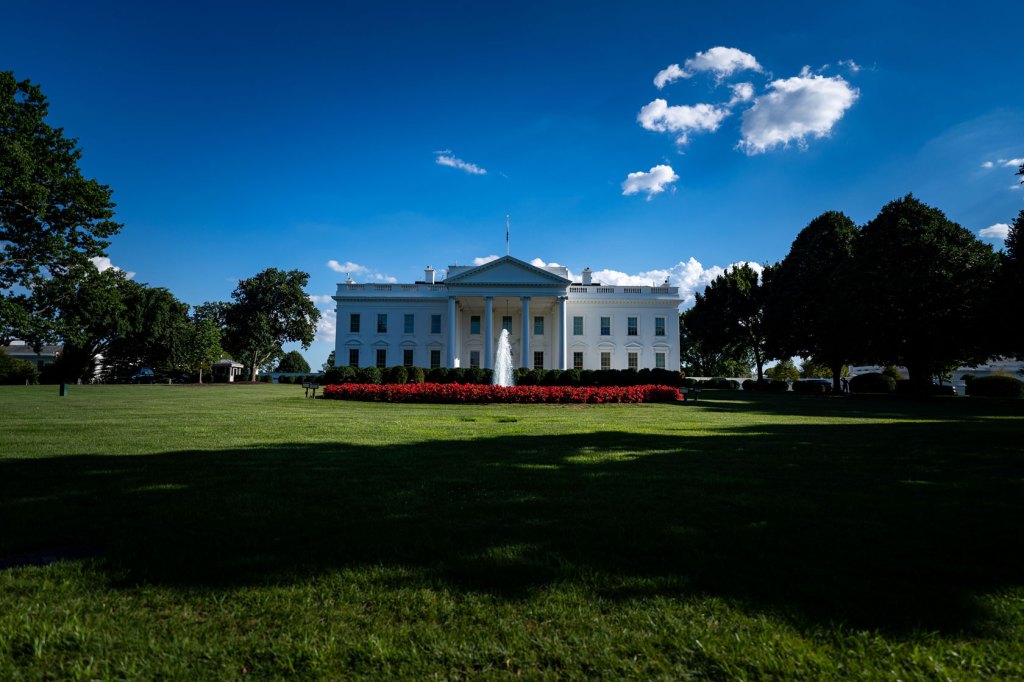 Photo shows a view of the White House.