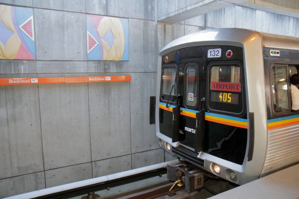 A train arrives in a metro station.