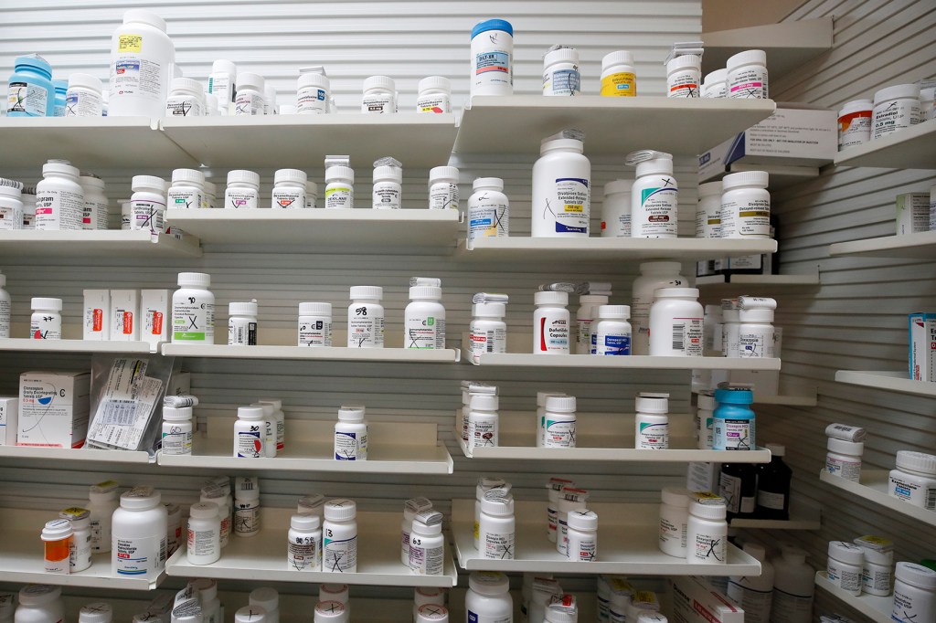 Bottles of pills on shelves