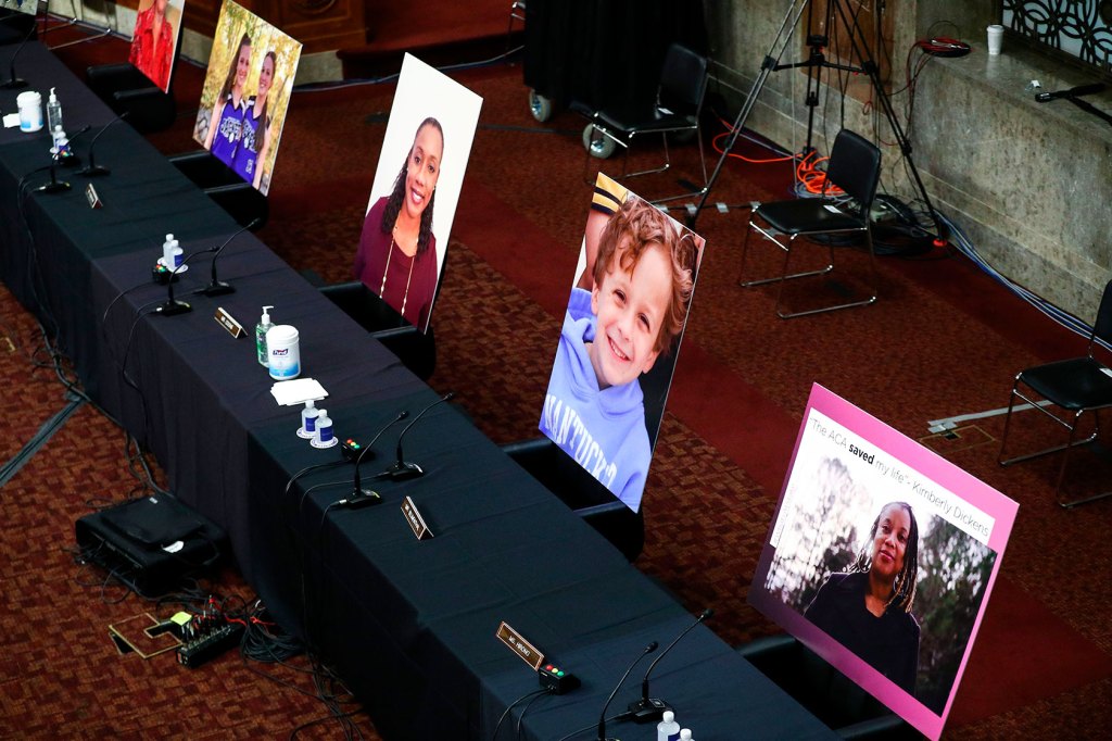 Portraits of a people who rely on the Affordable Care Act are placed in the seats of senators.