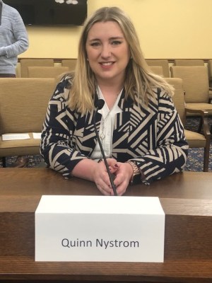 Quinn Nystrom, pictured in December 2019, testifies about insulin affordability at the Minnesota State Capitol